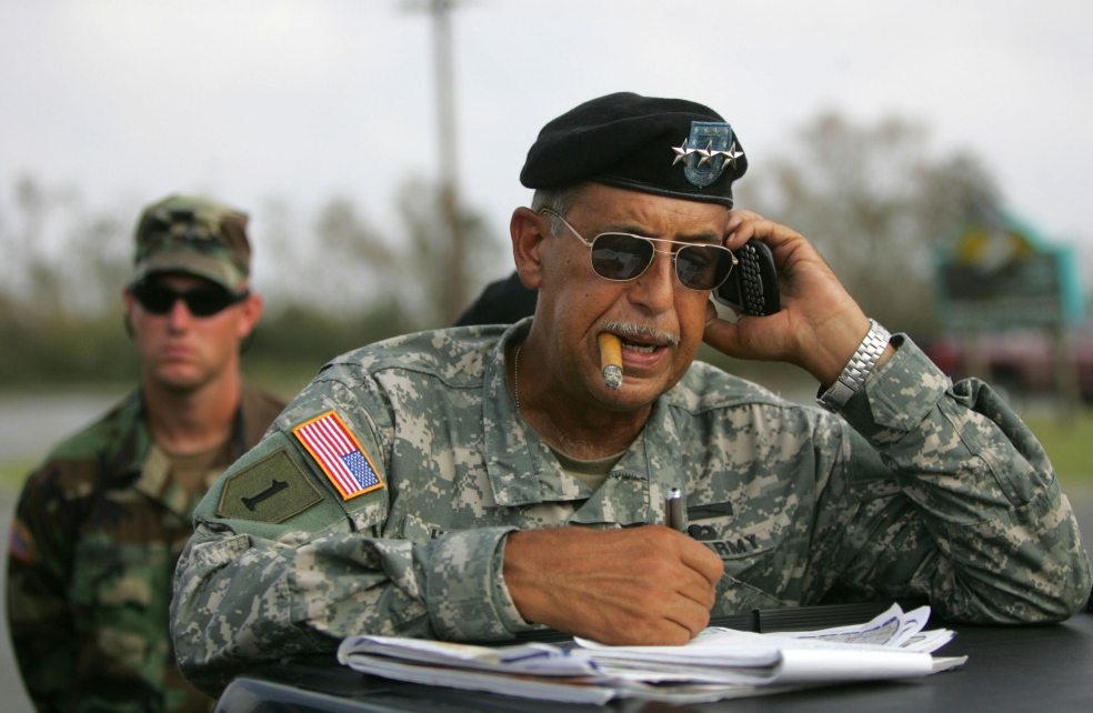 U.S. Army Lieutenant General Russel Honore talks on a mobile phone at a checkpoint in Cameron Prairi..